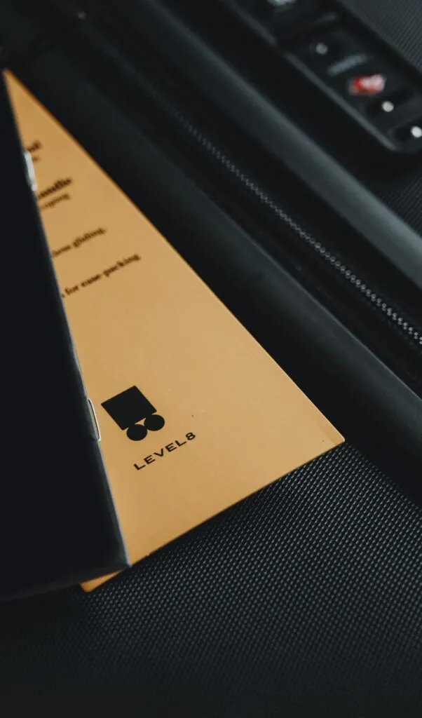 level 8 luminous textured luggage set review - are level 8 suitcases worth it - best suitcases for digital nomads - sturdy suitcases brands - best carry on suitcases - level 8 brand story - level 8 luggage review set - level 8 black suitcases