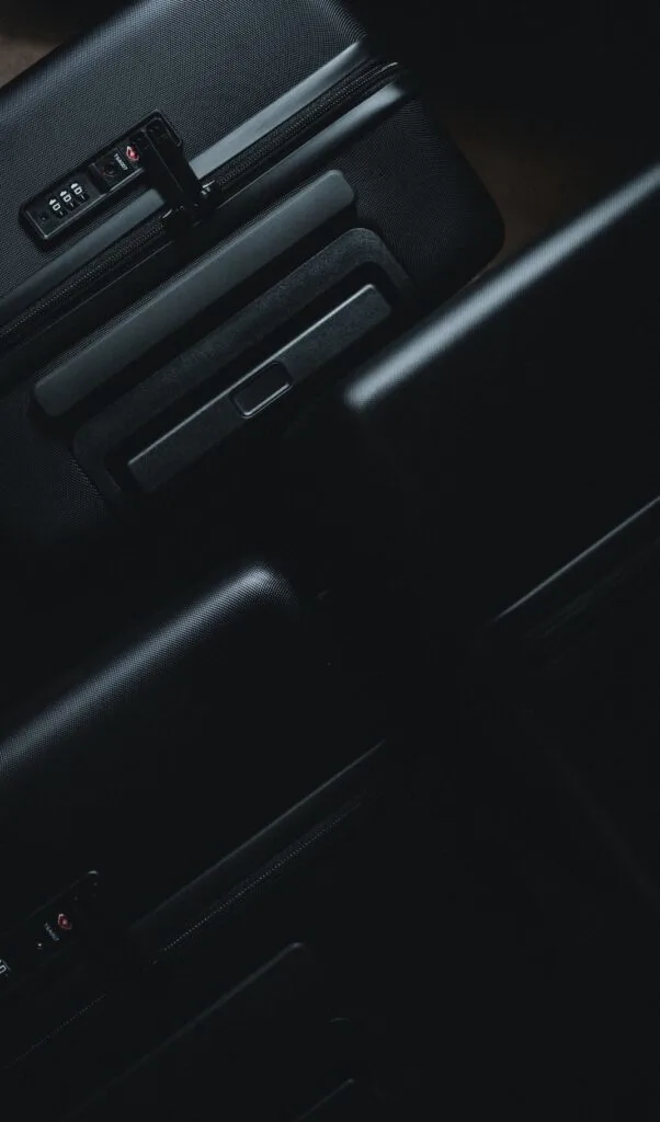 level 8 luminous textured luggage set review - are level 8 suitcases worth it - best suitcases for digital nomads - sturdy suitcases brands - best carry on suitcases - level 8 brand story - level 8 luggage review set - level 8 black suitcases
