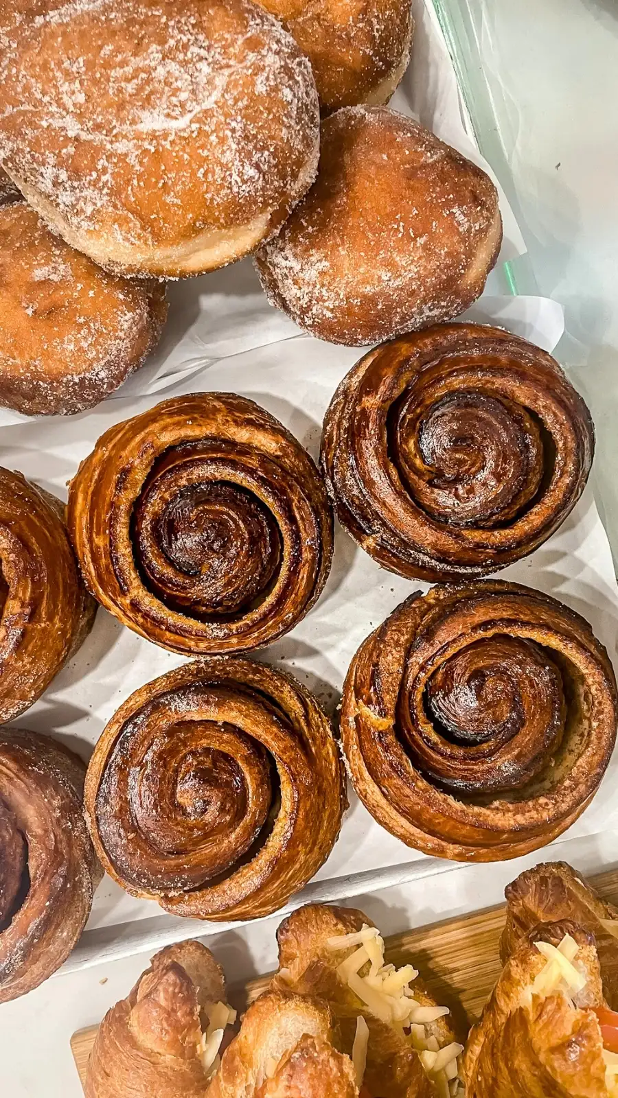 secret cafes in london food guide - london nest deli willesden green review photos menu - best breakfast in london cinnamon buns, muffins, banana bread - must eat places in london travel guide