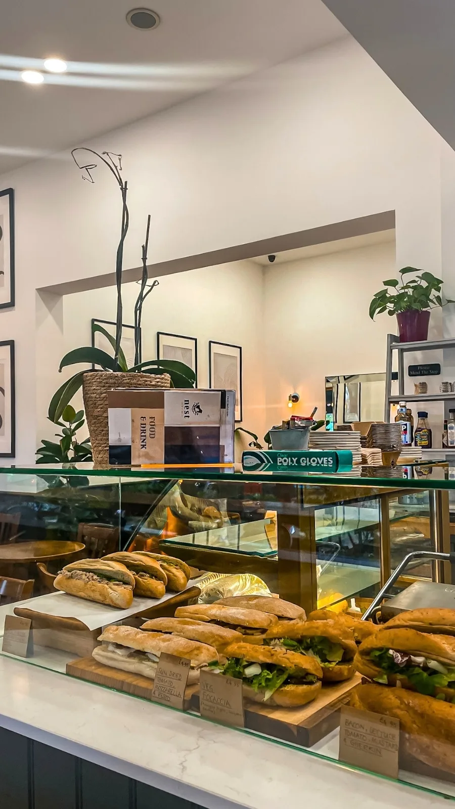 secret cafes in london food guide - london nest deli willesden green review photos menu - best breakfast in london cinnamon buns, muffins, banana bread - must eat places in london travel guide