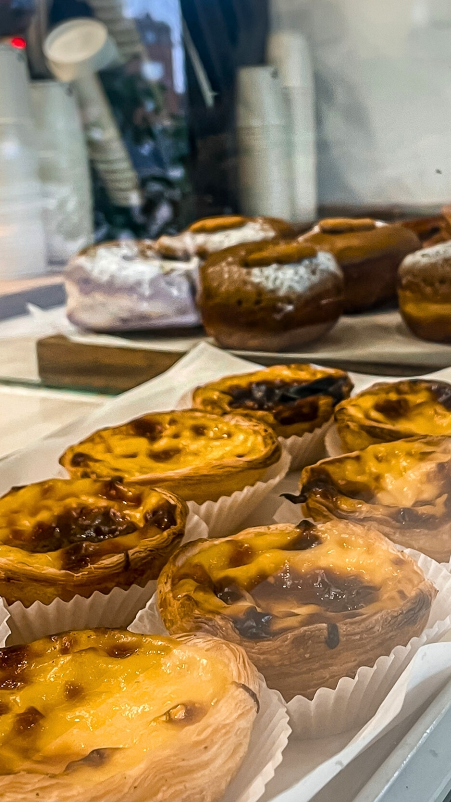 secret cafes in london food guide - london nest deli willesden green review photos menu - best breakfast in london cinnamon buns, muffins, banana bread - must eat places in london travel guide