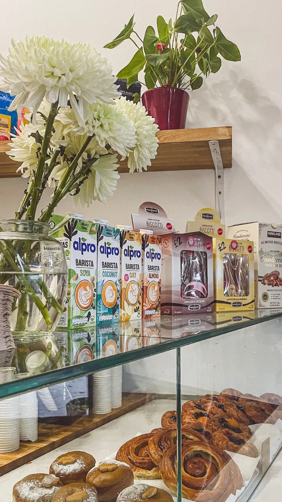 secret cafes in london food guide - london nest deli willesden green review photos menu - best breakfast in london cinnamon buns, muffins, banana bread - must eat places in london travel guide