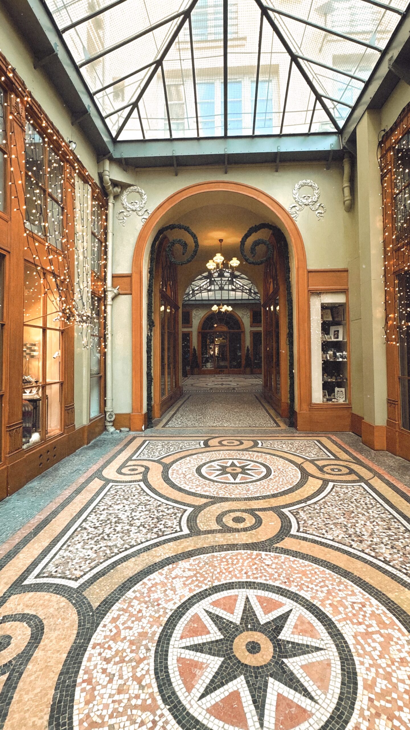 most beautiful covered passages in paris galerie vivienne photos history - best photo spots in paris secret places hidden gems - what to see in paris off the beaten path travel guide bucket list