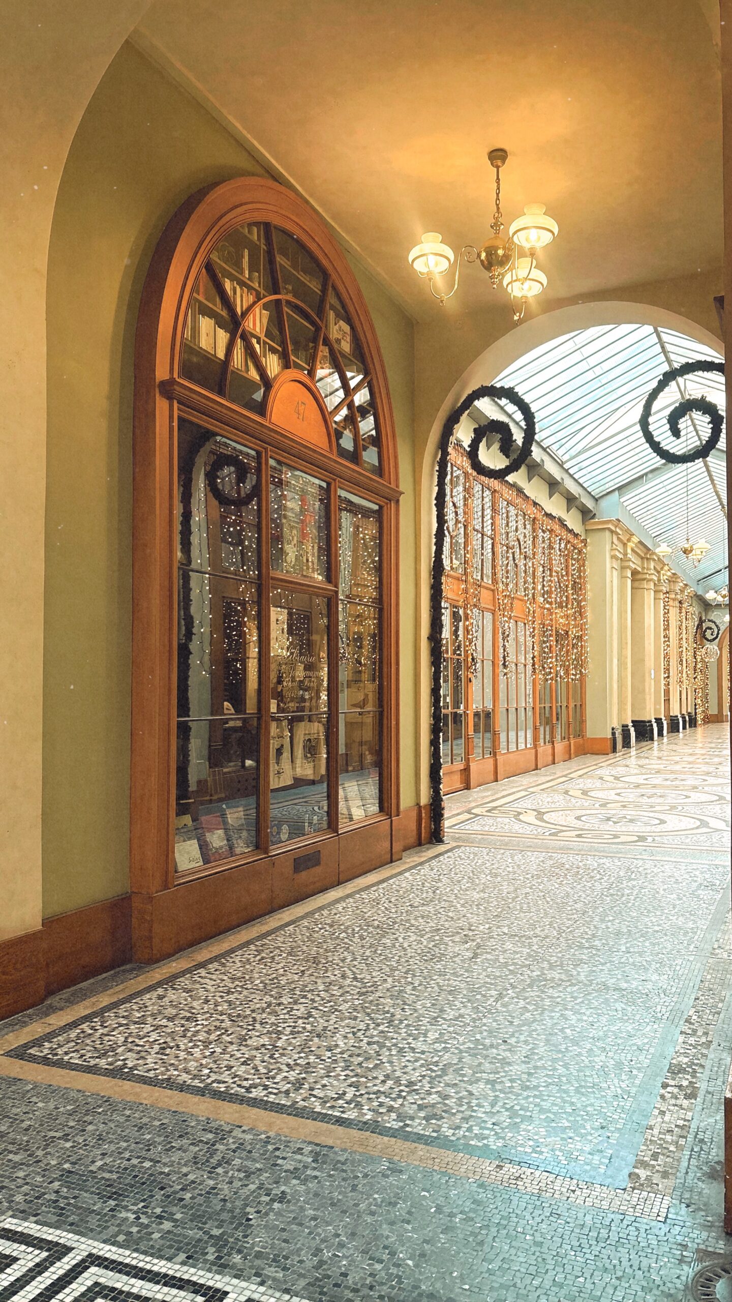 most beautiful covered passages in paris galerie vivienne photos history - best photo spots in paris secret places hidden gems - what to see in paris off the beaten path travel guide bucket list