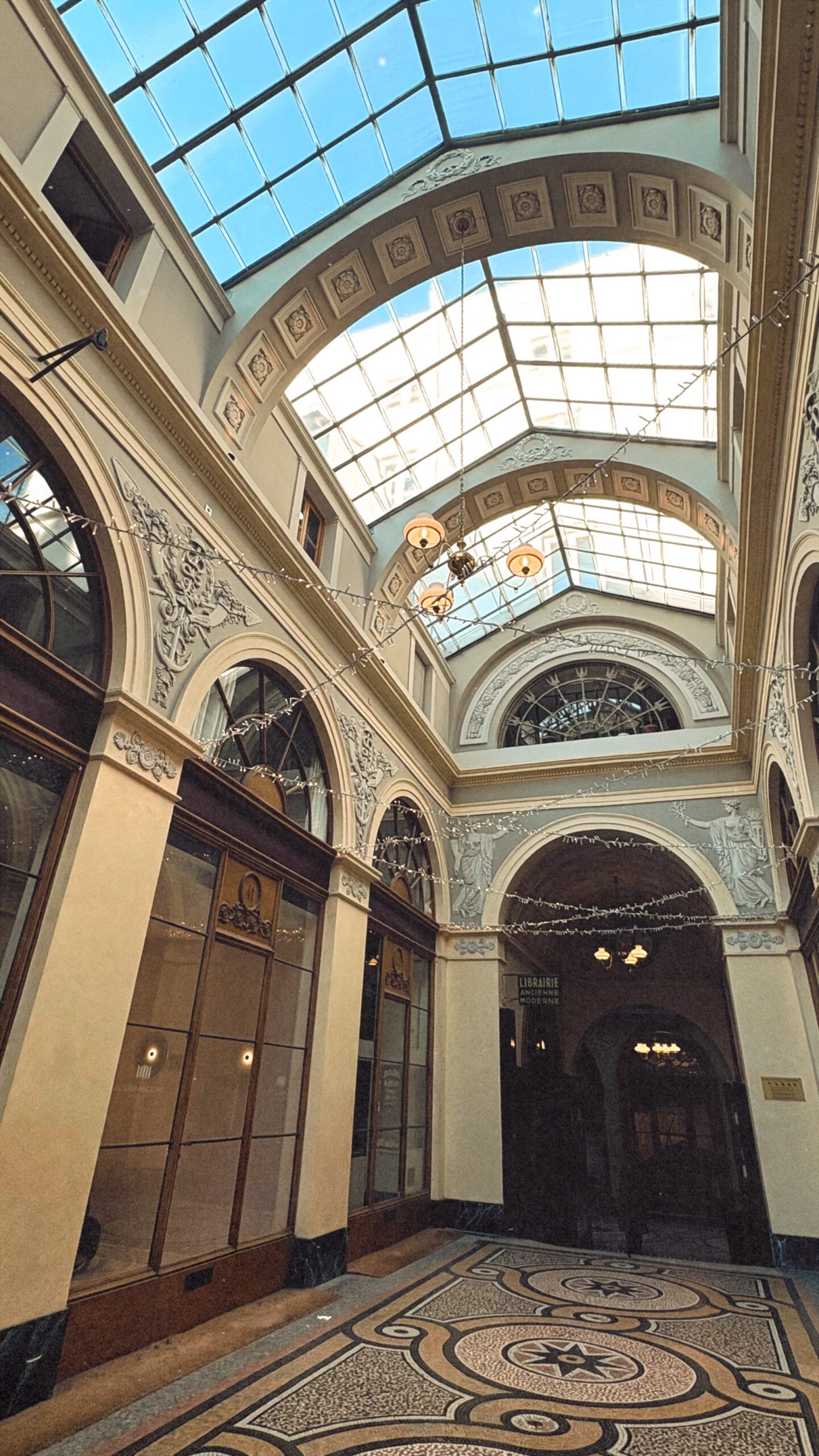 most beautiful covered passages in paris galerie vivienne photos history - best photo spots in paris secret places hidden gems - what to see in paris off the beaten path travel guide bucket list