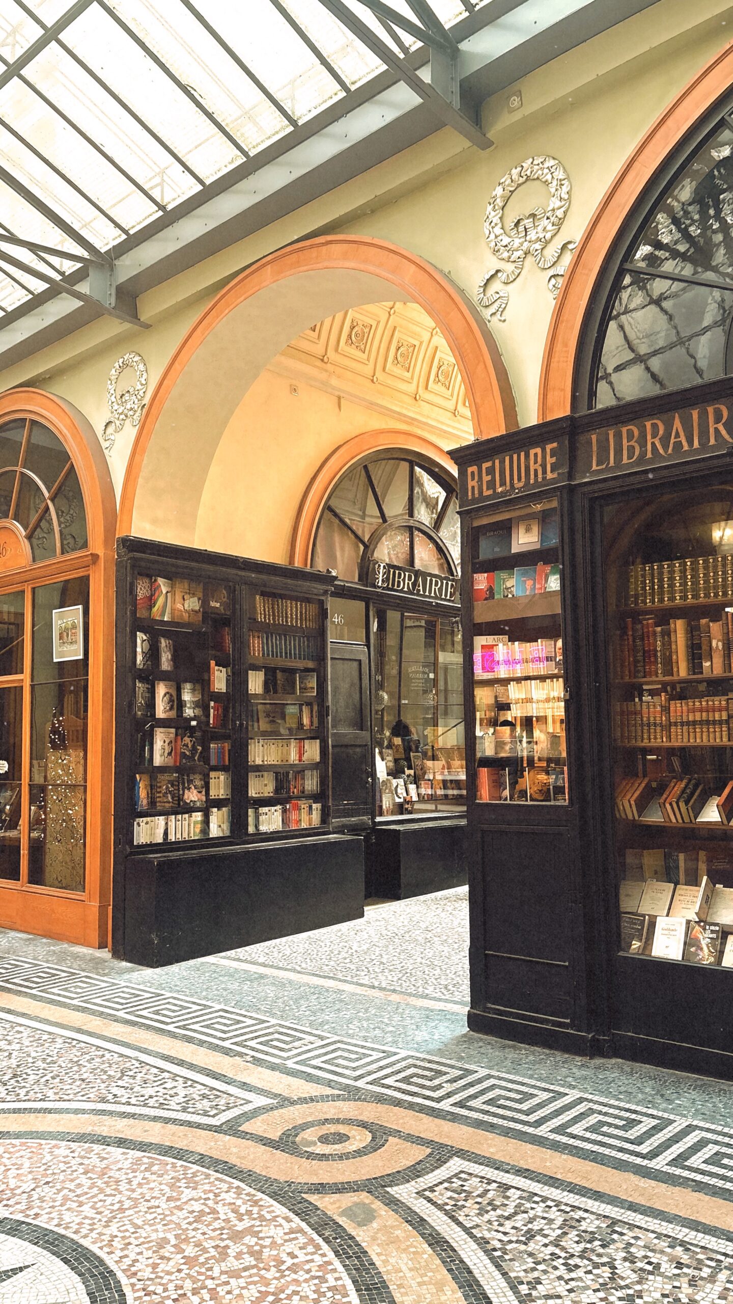 most beautiful covered passages in paris galerie vivienne photos history - best photo spots in paris secret places hidden gems - what to see in paris off the beaten path travel guide bucket list