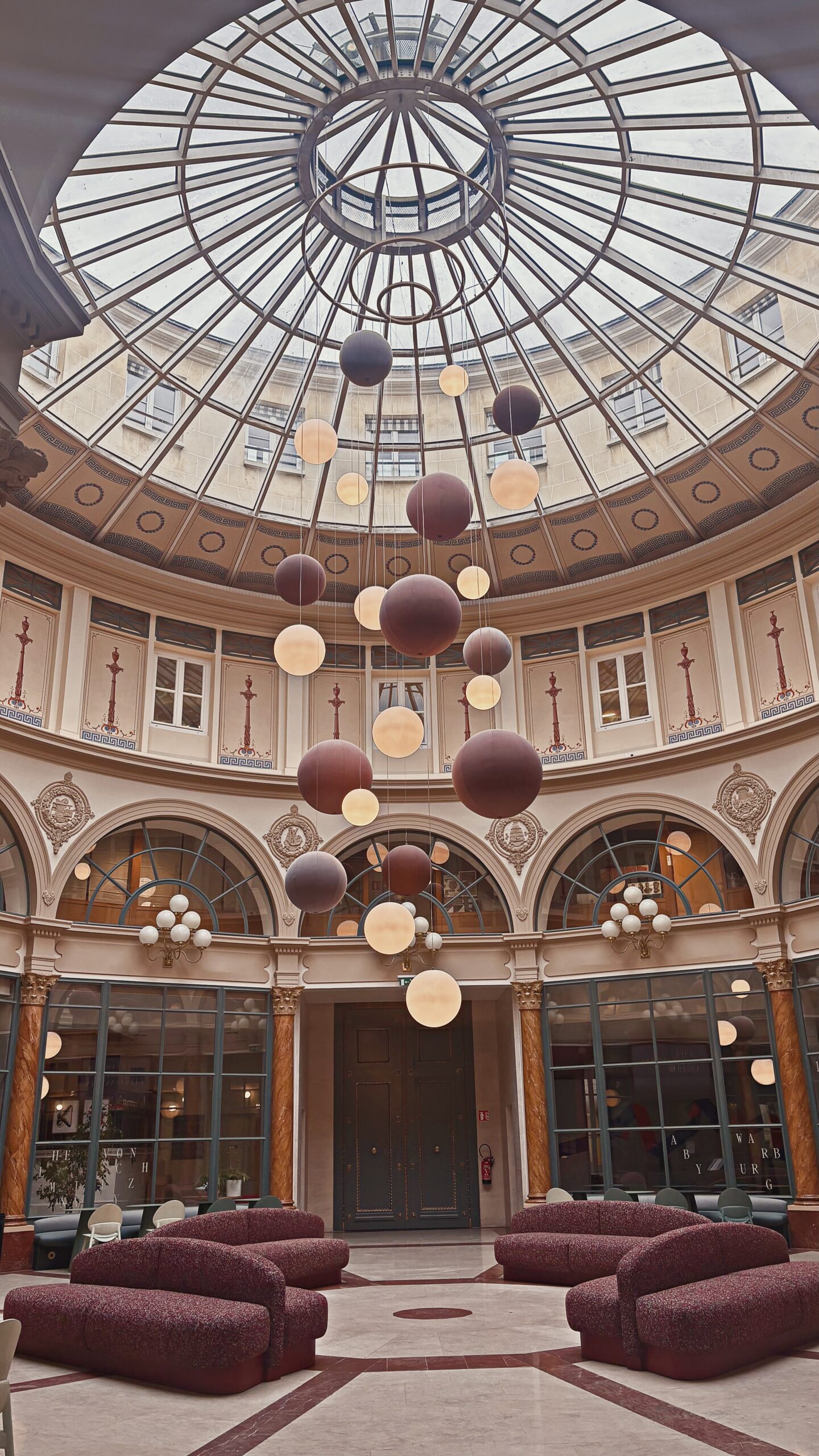 best hidden gems in paris galerie colbert history photos review - secret covered passages in paris travel guide bucket list - beautiful places in paris off the beaten path