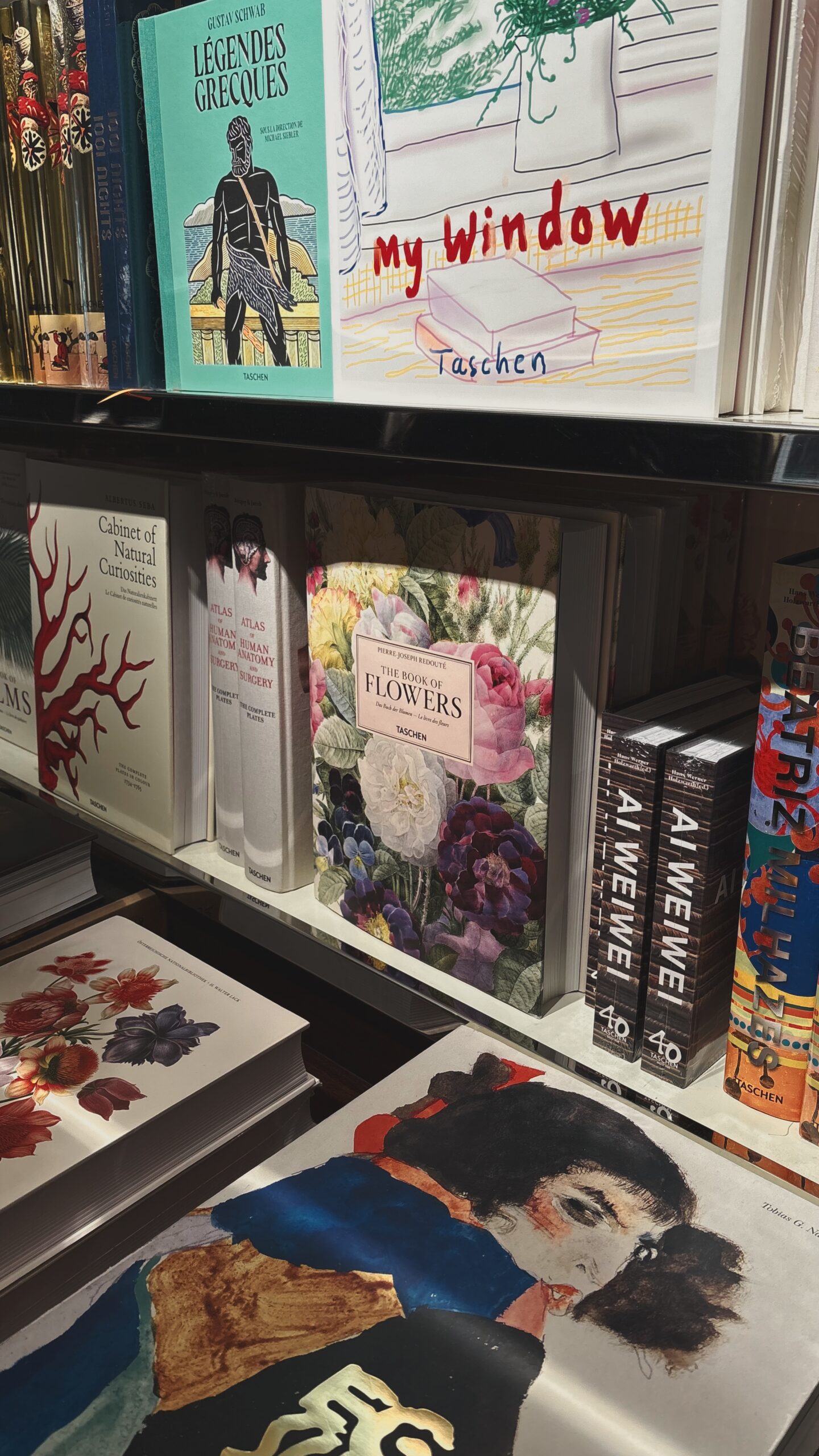 best bookstores in paris taschen rue de buci photos - shopping in saint germain des pres 6th arrondissement paris travel guide - beautiful shops in paris bucket list