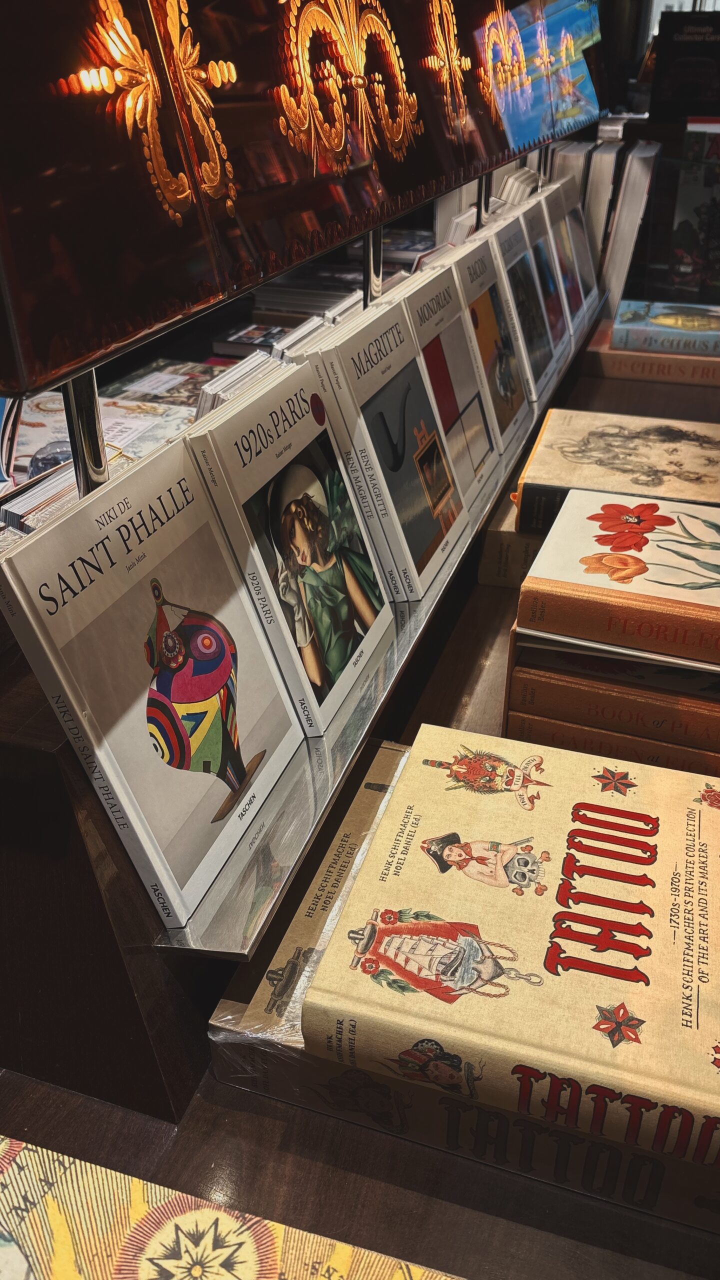 best bookstores in paris taschen rue de buci photos - shopping in saint germain des pres 6th arrondissement paris travel guide - beautiful shops in paris bucket list