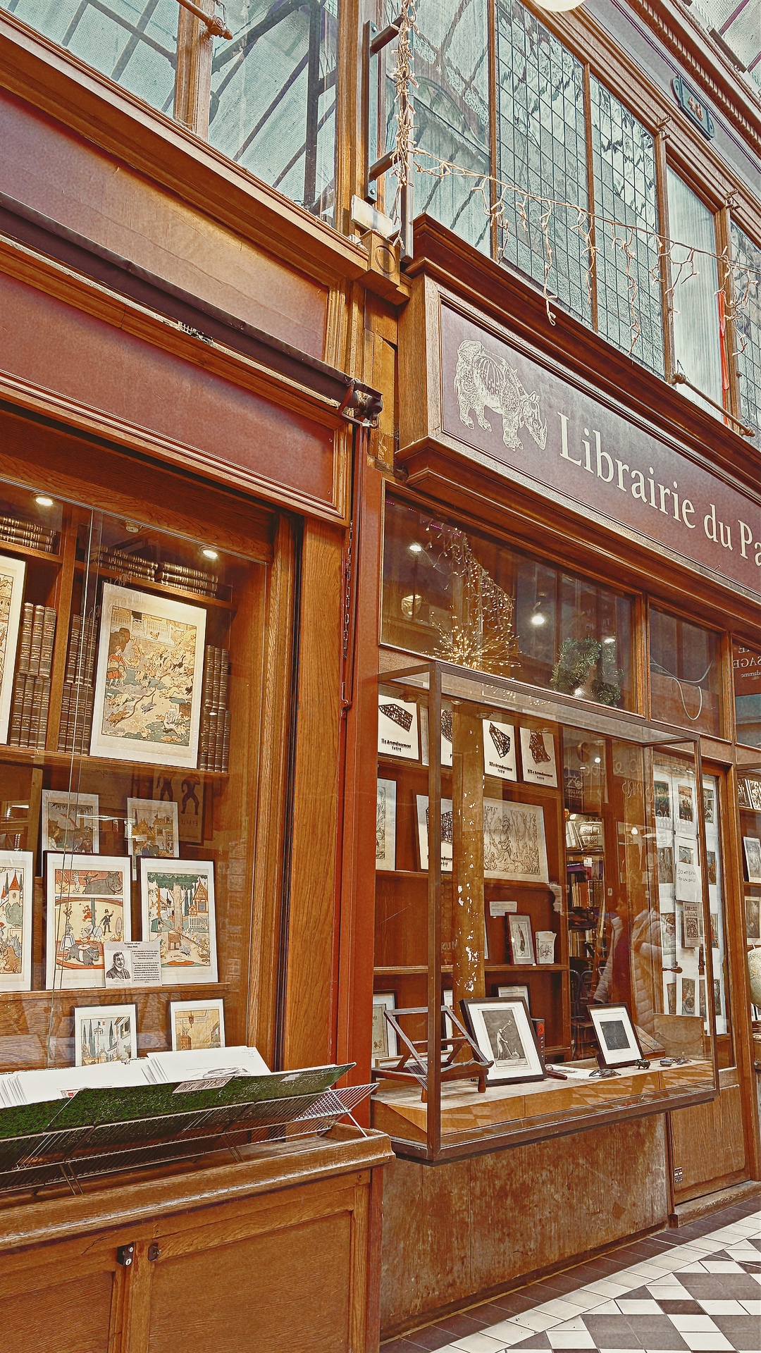 historic old places in paris passage jouffroy grands boulevards photos review history - most beautiful places in paris off the beaten path travel guide bucket list - covered passages in paris