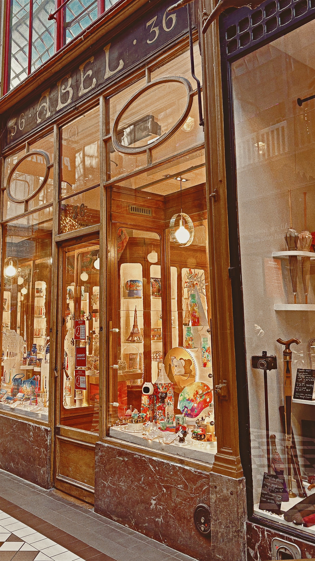 historic old places in paris passage jouffroy grands boulevards photos review history - most beautiful places in paris off the beaten path travel guide bucket list - covered passages in paris abel
