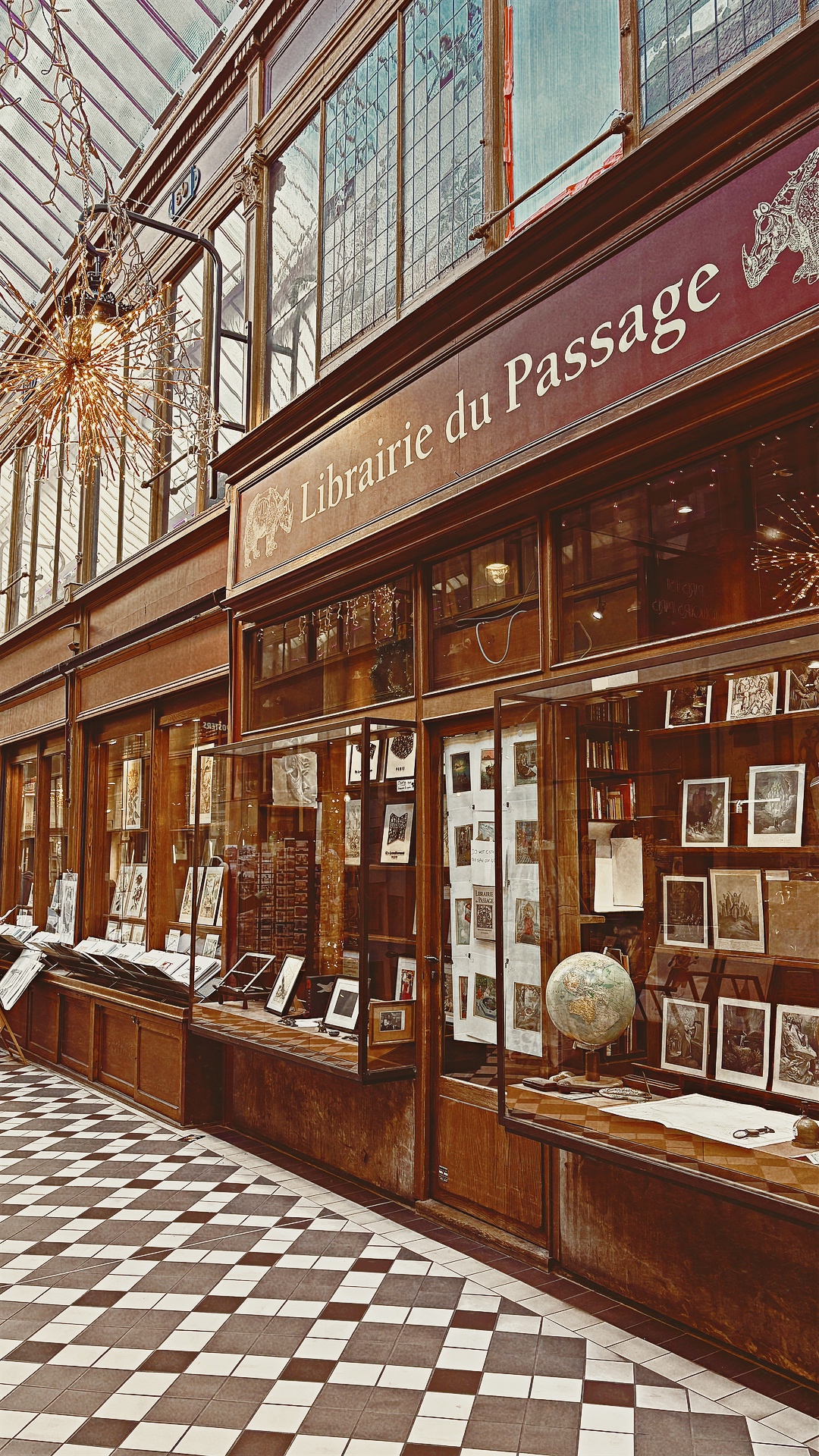 historic old places in paris passage jouffroy grands boulevards photos review history - most beautiful places in paris off the beaten path travel guide bucket list - covered passages in paris librairie du passage