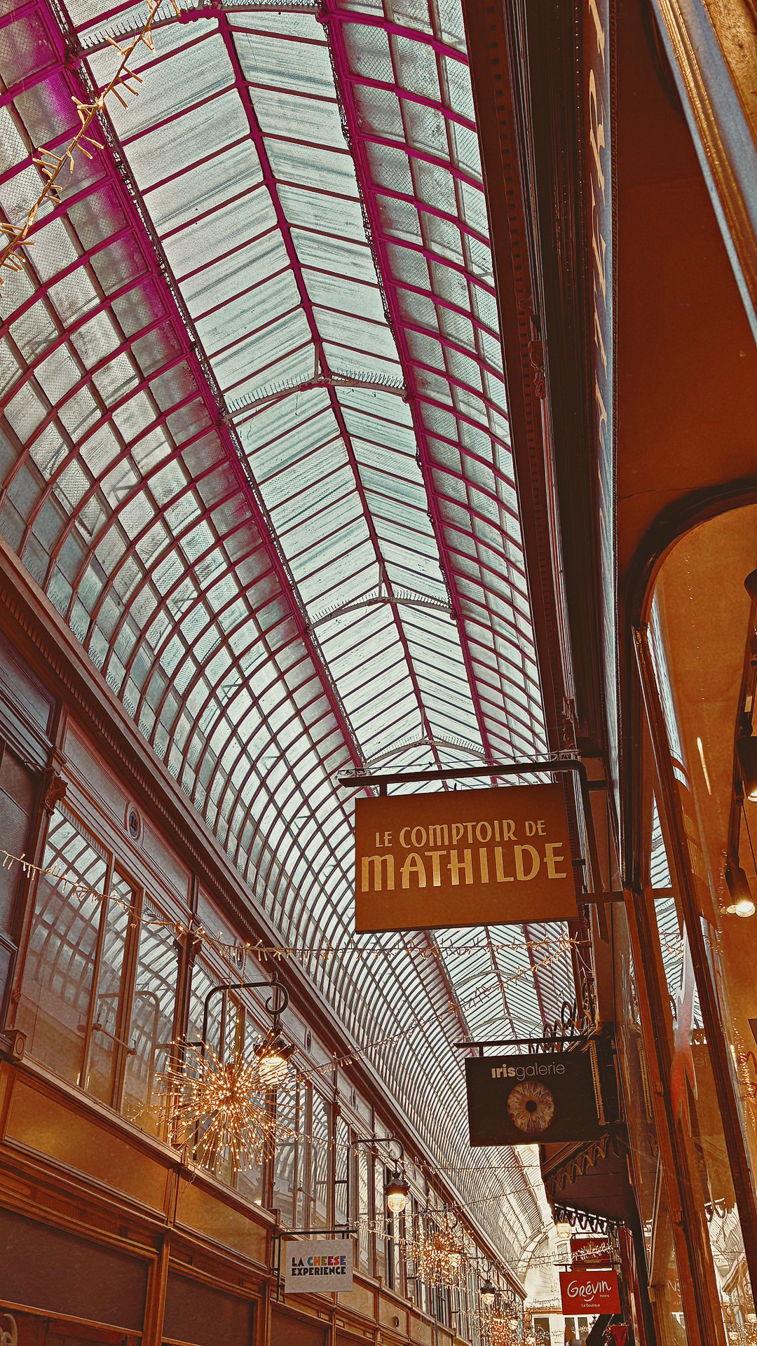 historic old places in paris passage jouffroy grands boulevards photos review history - most beautiful places in paris off the beaten path travel guide bucket list - covered passages in paris
