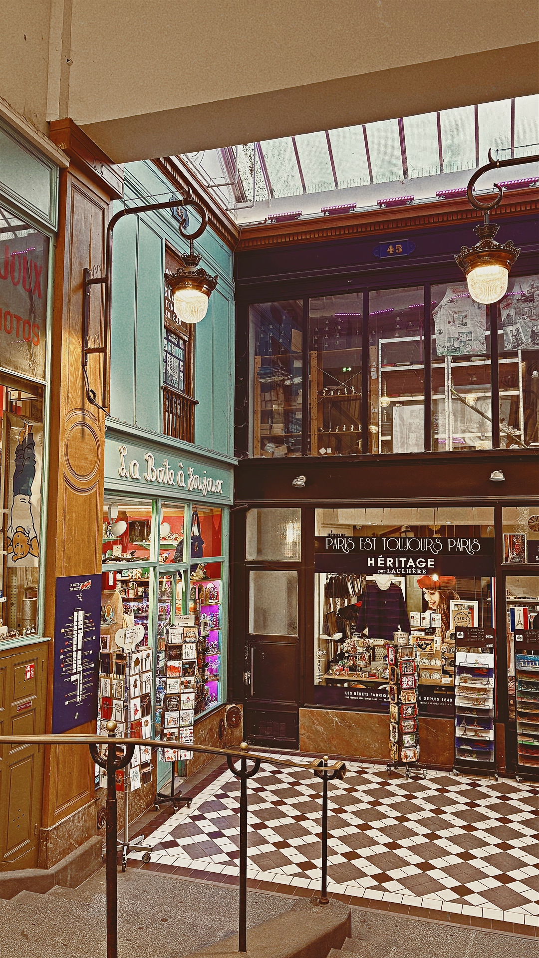 historic old places in paris passage jouffroy grands boulevards photos review history - most beautiful places in paris off the beaten path travel guide bucket list - covered passages in paris la boite a joujoux