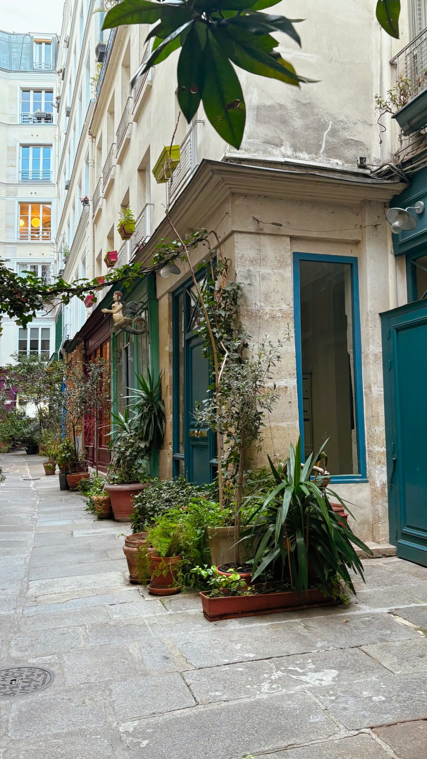 secret alleys in paris passage de l'ancre photos review - hidden villages in paris travel guide bucket list - best things to do in the spring in paris off the beaten path - colorful places in paris