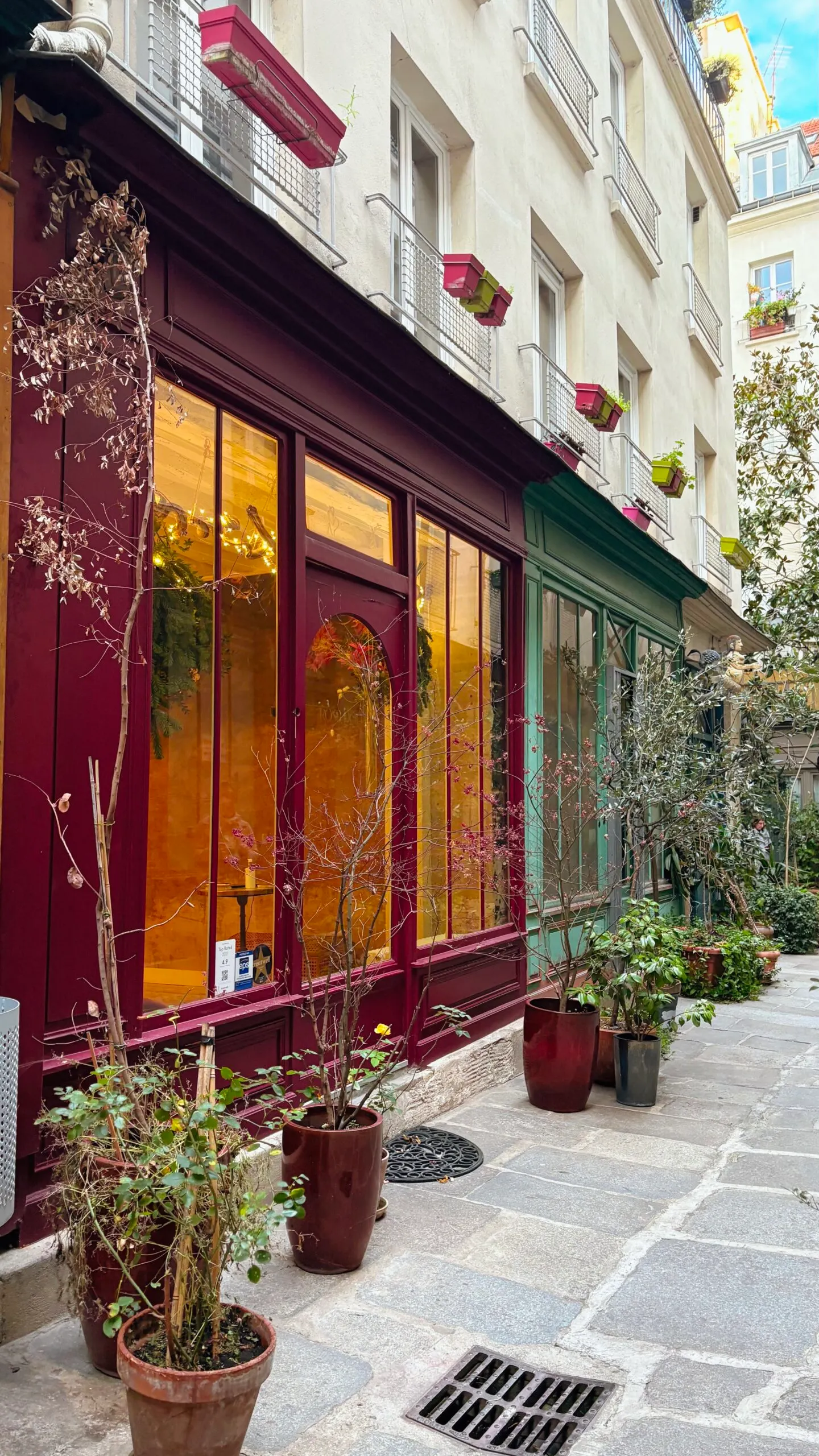 secret alleys in paris passage de l'ancre photos review - hidden villages in paris travel guide bucket list - best things to do in the spring in paris off the beaten path - colorful places in paris